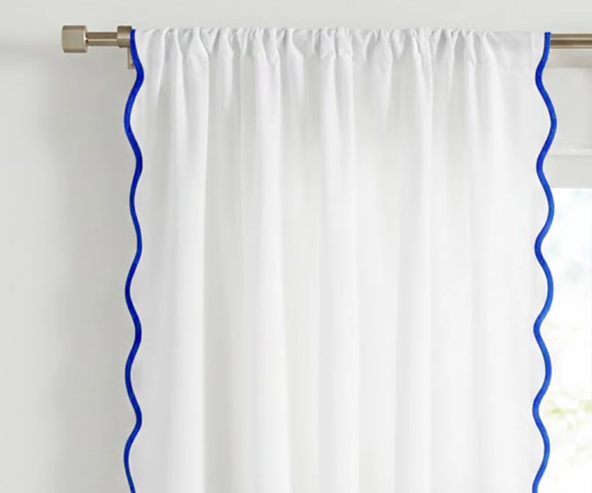 White scalloped curtain panel with royal blue trim White scalloped curtain panel with royal blue trim