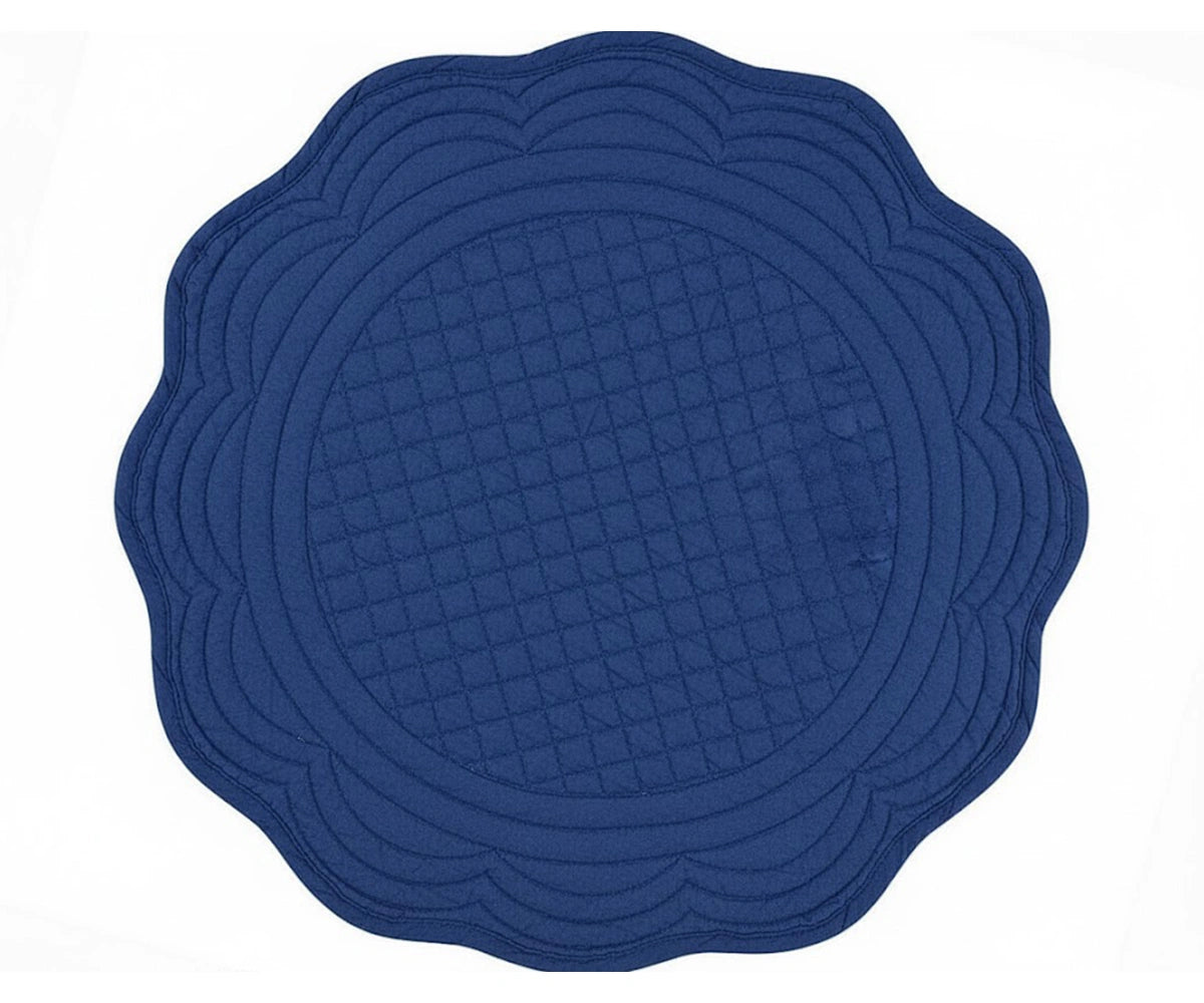 Royal blue quilted cotton round placemat with scalloped edge for modern and elegant dining table décor Royal blue quilted cotton round placemat with scalloped edge for modern and elegant dining table décor