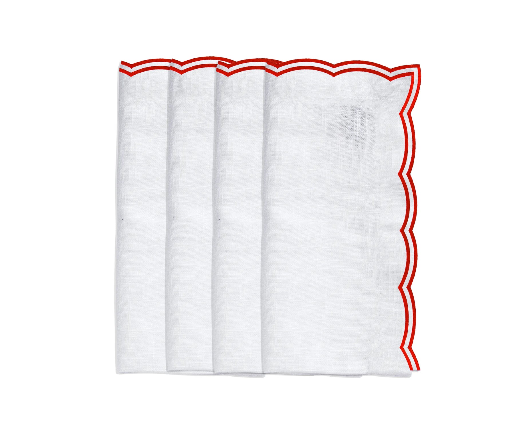 Red scalloped napkins styled for a festive holiday tablescape Red scalloped napkins styled for a festive holiday tablescape