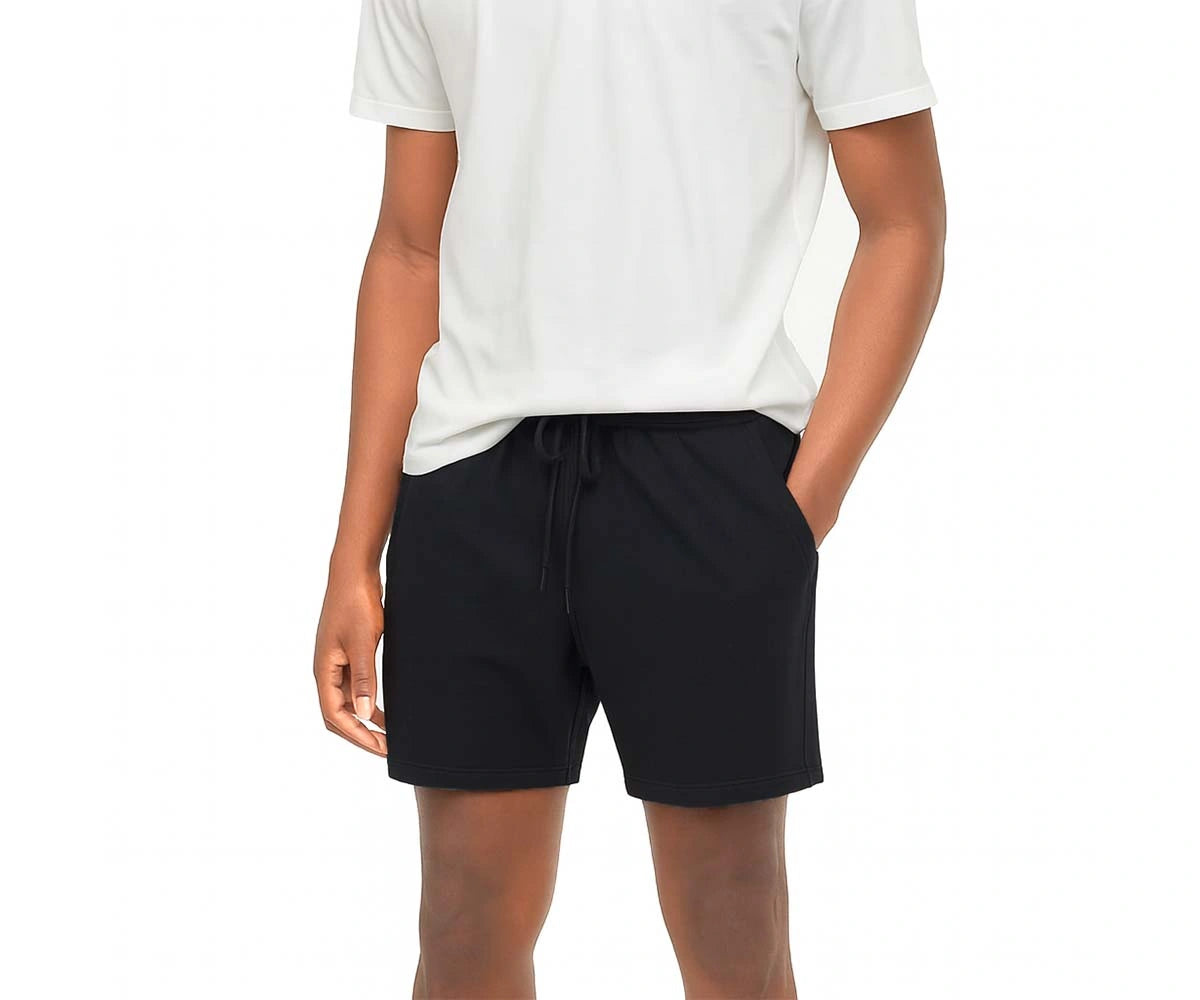 Black men’s sports shorts made from breathable polyester – gym, running, and training shorts. Black men’s sports shorts made from breathable polyester – gym, running, and training shorts.