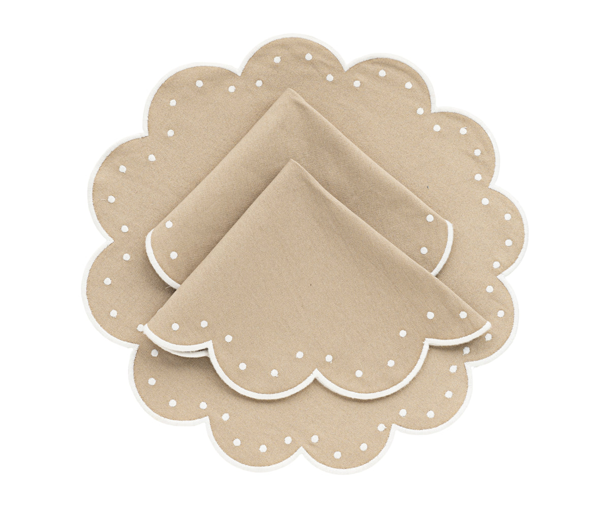 Round placemats arranged on a round dining table for a formal look Round placemats arranged on a round dining table for a formal look