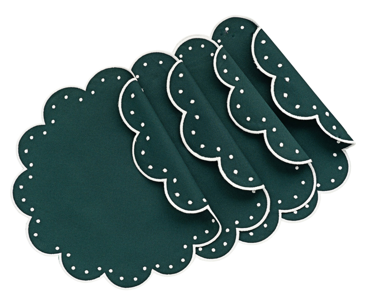 Holiday-themed scalloped edge placemats featuring festive patterns and warm seasonal tones Holiday-themed scalloped edge placemats featuring festive patterns and warm seasonal tones