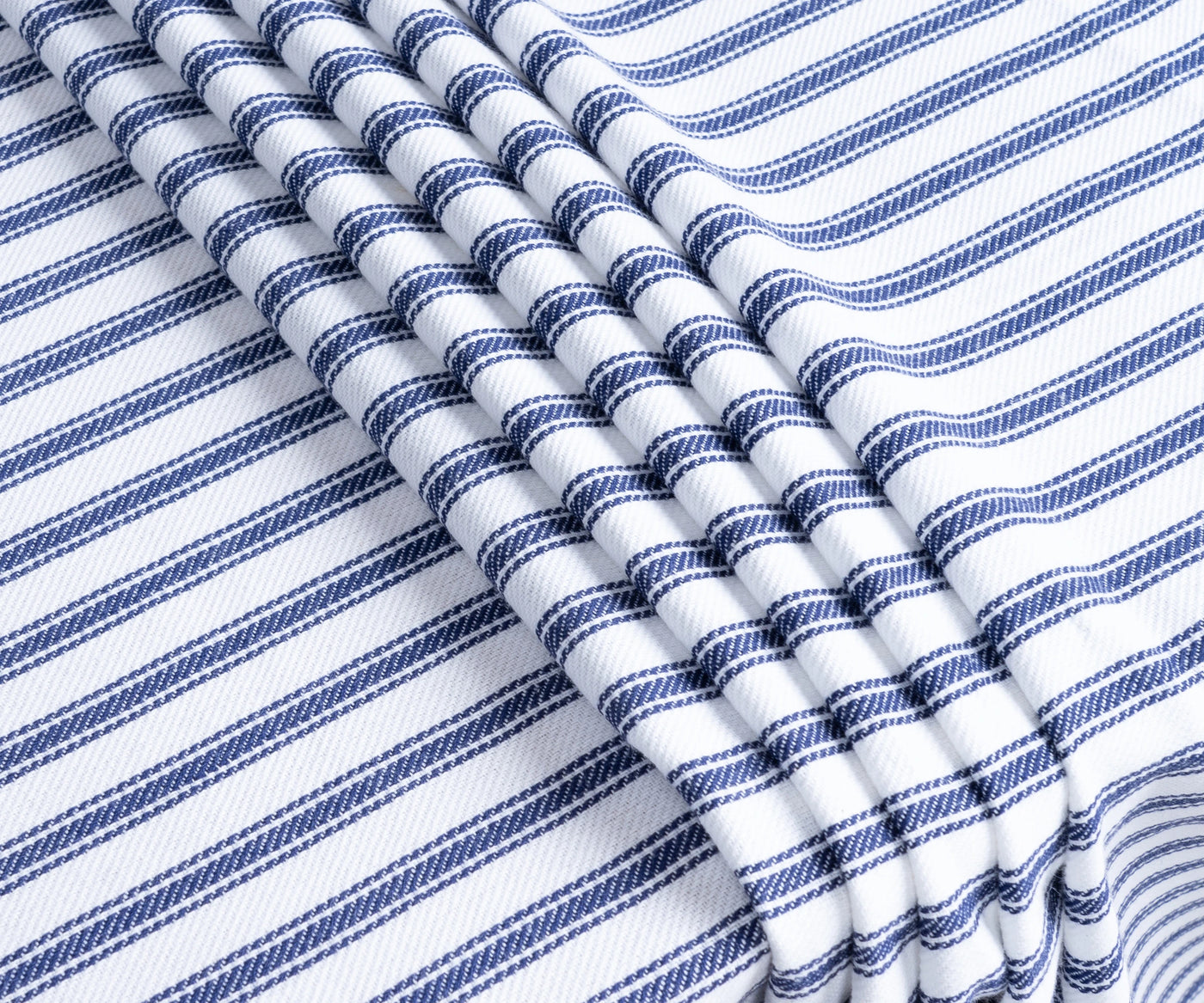 Close-up of navy ticking stripe pattern on 100 percent cotton fabric Close-up of navy ticking stripe pattern on 100 percent cotton fabric