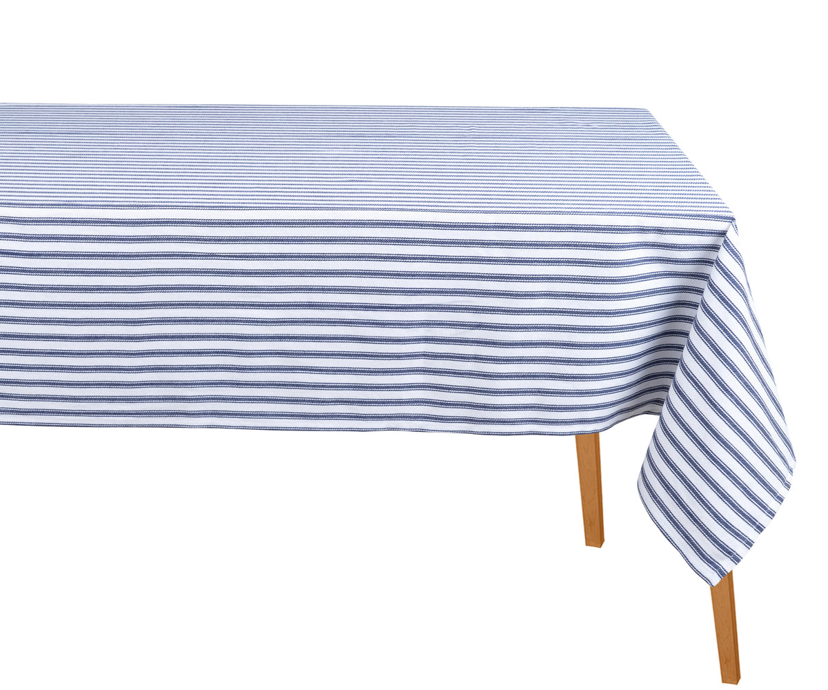 Navy blue and white striped rectangular cotton tablecloth on a dining table Navy blue and white striped rectangular cotton tablecloth on a dining table