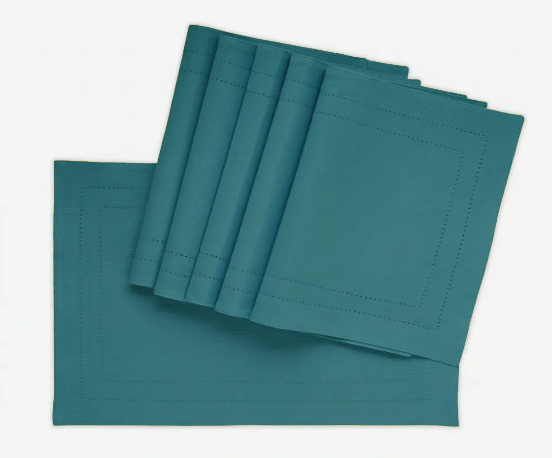 Teal double hemstitch cotton placemats on dining table – 13x18 inch rectangle table mats Teal double hemstitch cotton placemats on dining table – 13x18 inch rectangle table mats
