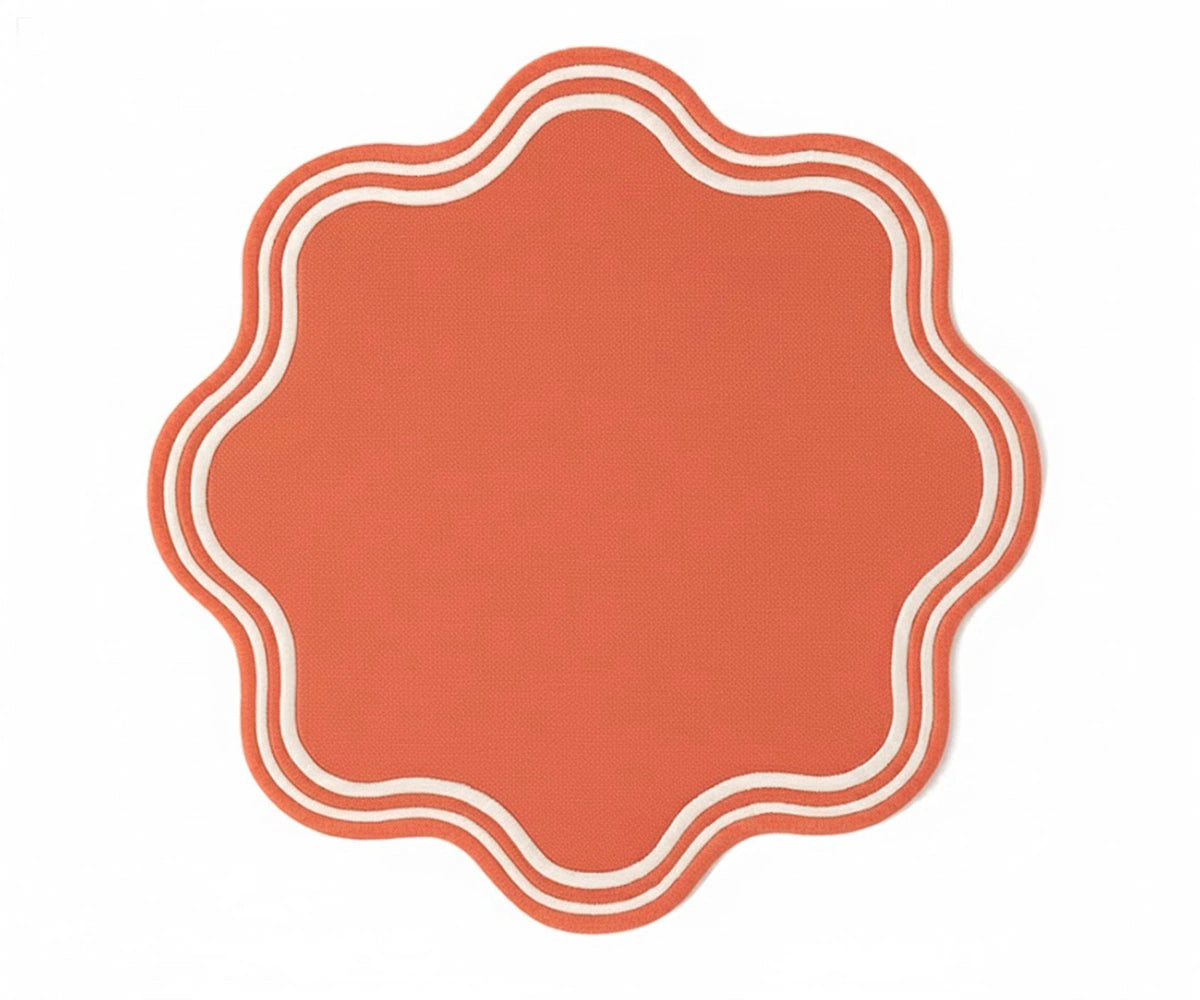 Terracotta scalloped round placemat on dining table – autumn table décor, cotton placemat with scalloped edges. Terracotta scalloped round placemat on dining table – autumn table décor, cotton placemat with scalloped edges.
