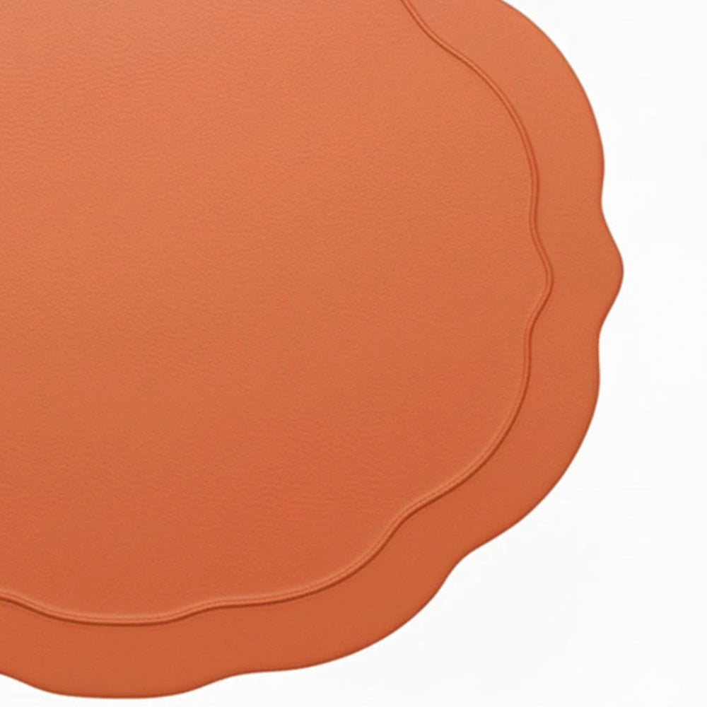 Terracotta oval scalloped edge placemats crafted from 100% cotton with decorative embroidery Terracotta oval scalloped edge placemats crafted from 100% cotton with decorative embroidery