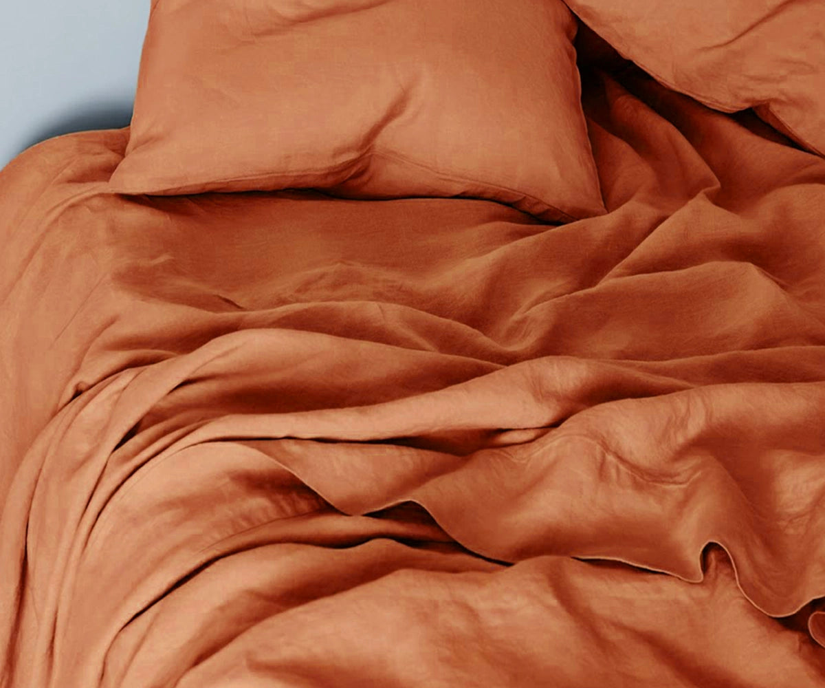 linen bedding set with earthy-toned linen sheets and duvet cover, perfect for warm and cozy bedroom décor. linen bedding set with earthy-toned linen sheets and duvet cover, perfect for warm and cozy bedroom décor.