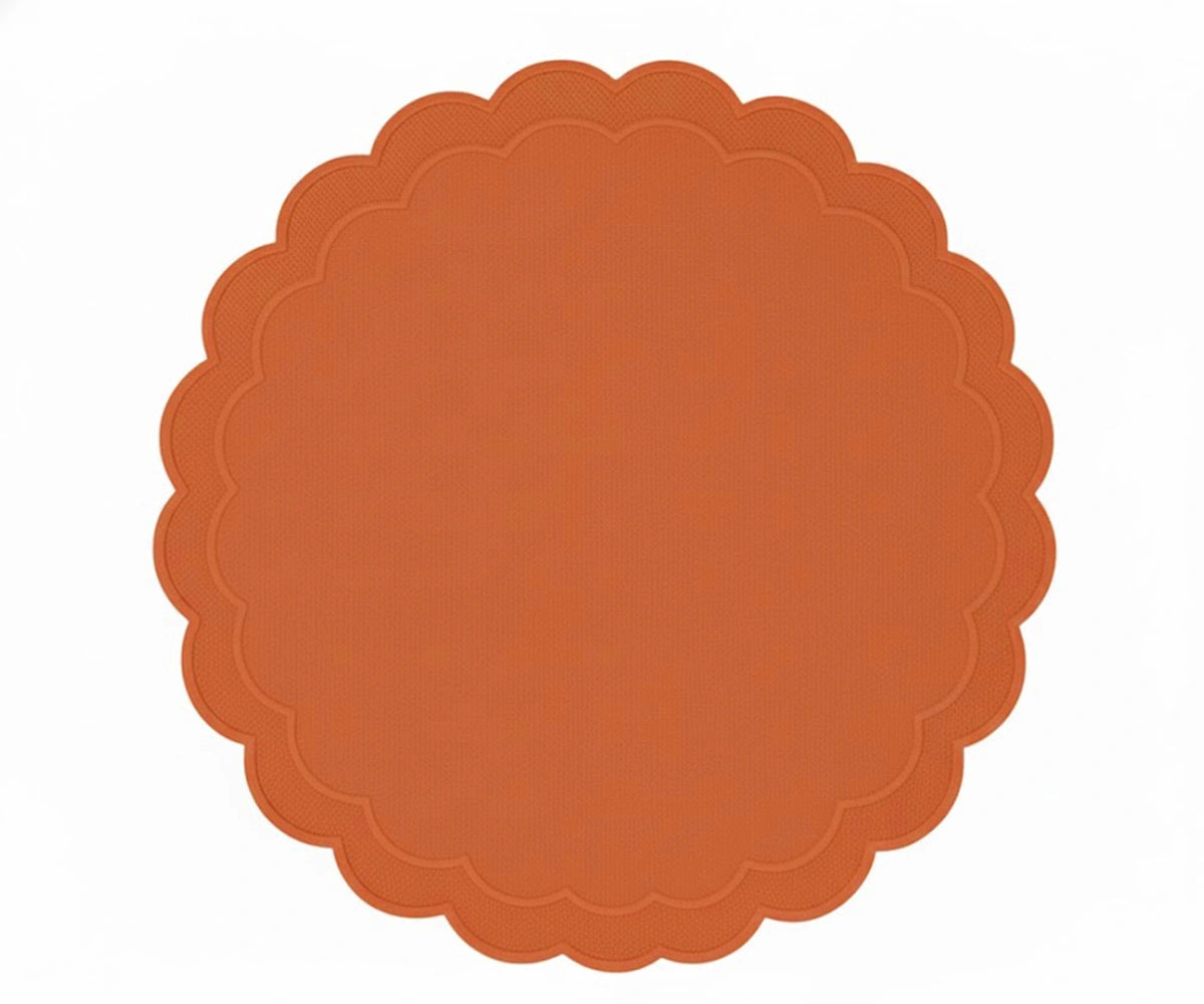 Terracotta round placemat with scalloped border made from 100% cotton for warm dining décor Terracotta round placemat with scalloped border made from 100% cotton for warm dining décor