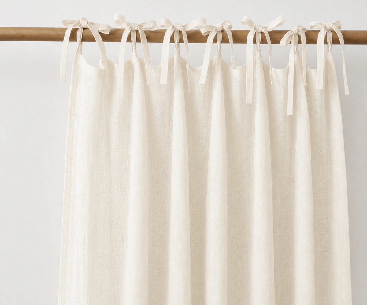 Ivory tie top linen curtains in 100% European flax linen, natural light filtering curtain panels for farmhouse living room and bedroom décor. Ivory tie top linen curtains in 100% European flax linen, natural light filtering curtain panels for farmhouse living room and bedroom décor.
