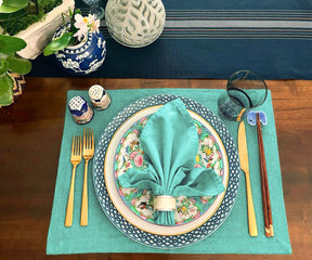 Elevate your dining experience with the gentle charm of Light Blue Cloth Napkins.