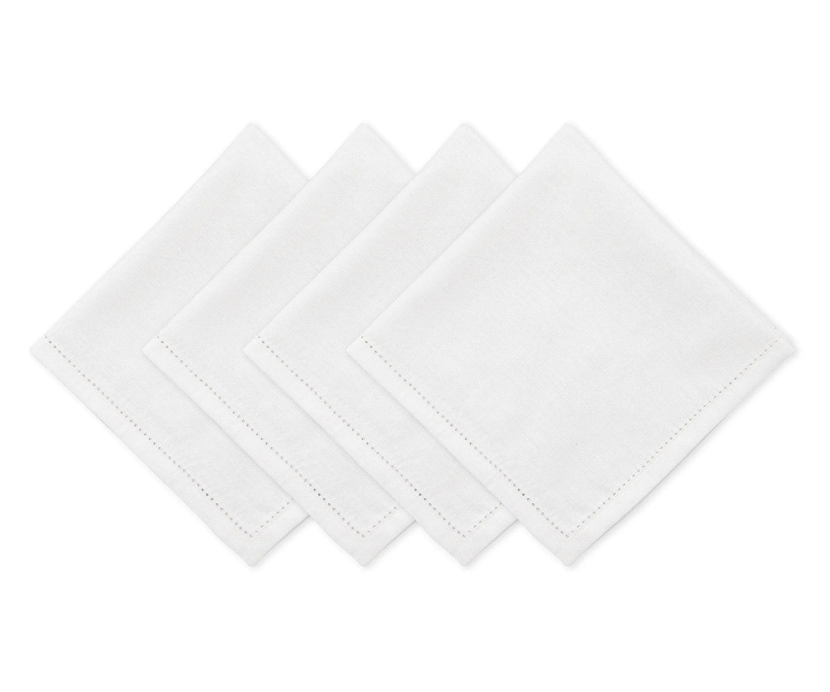 Soft white hemstitch napkins designed for refined and formal table settings Soft white hemstitch napkins designed for refined and formal table settings