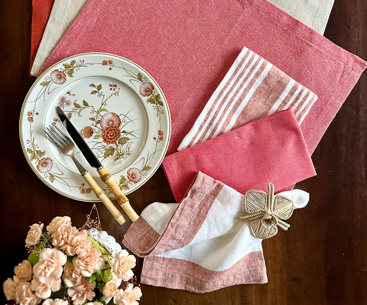 Wedding dinner setup with luxurious white linen napkins Wedding dinner setup with luxurious white linen napkins