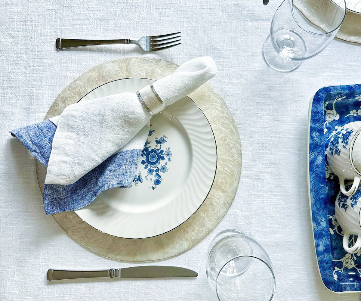 Image showcasing the variety of textures in our blue linen napkins Image showcasing the variety of textures in our blue linen napkins