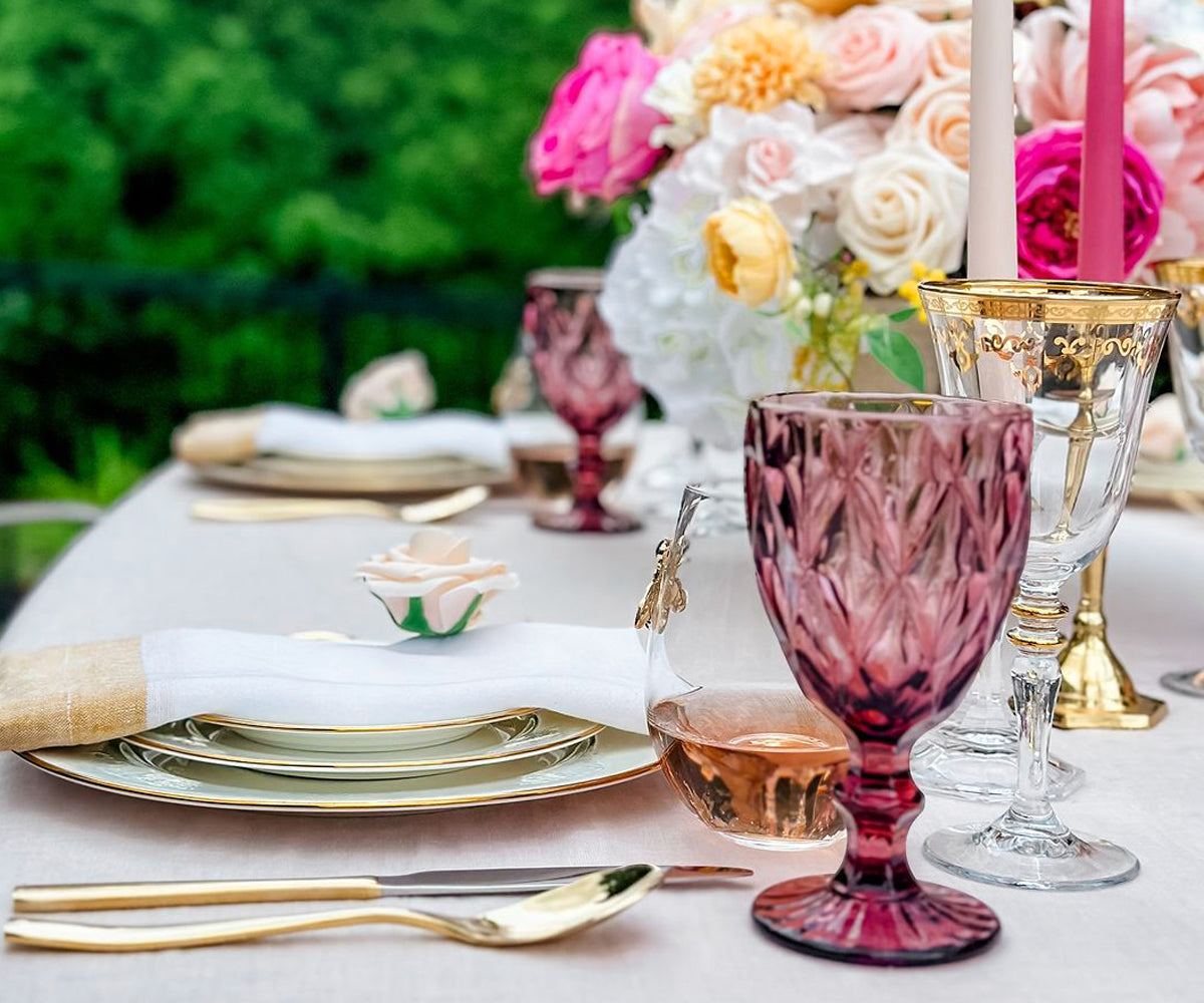Elegant linen napkin with stitched border placed beside a plate Elegant linen napkin with stitched border placed beside a plate