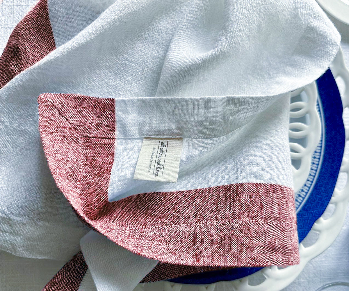 Eco-friendly linen napkins used in a formal dining setup Eco-friendly linen napkins used in a formal dining setup