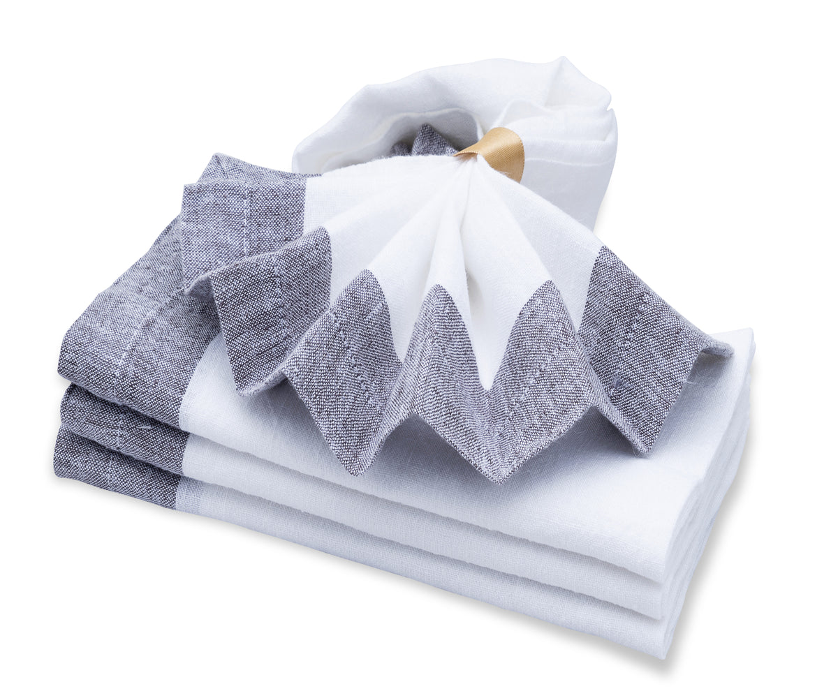Soft white cotton napkins proving simplicity at its best Soft white cotton napkins proving simplicity at its best