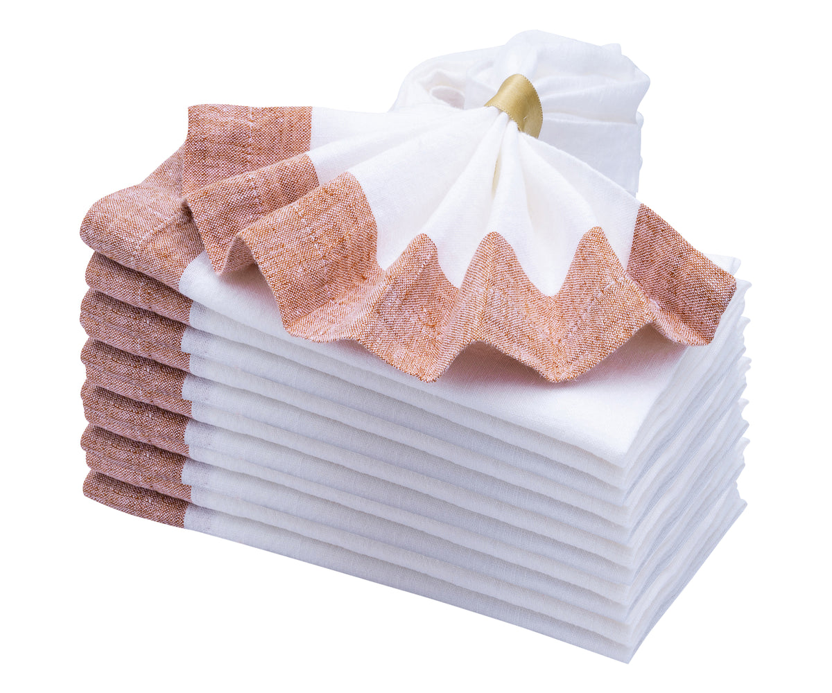 Soft and absorbent, rust linen napkins add a touch of luxury Soft and absorbent, rust linen napkins add a touch of luxury