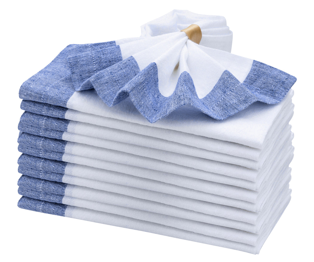 Dress up your dining table with luxurious blue and white linen napkins Dress up your dining table with luxurious blue and white linen napkins