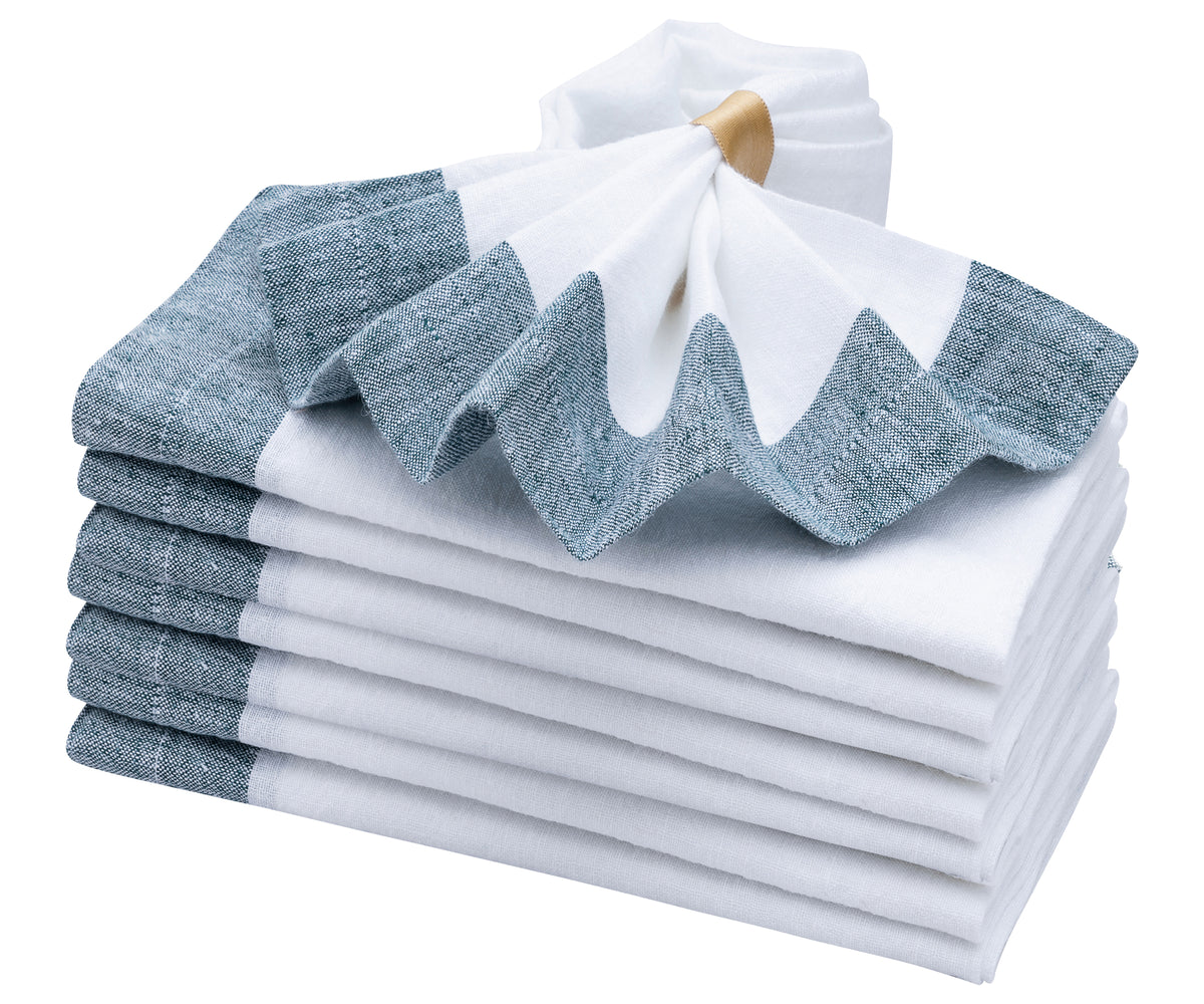 Simplify your table setting with elegant white linen napkins Simplify your table setting with elegant white linen napkins