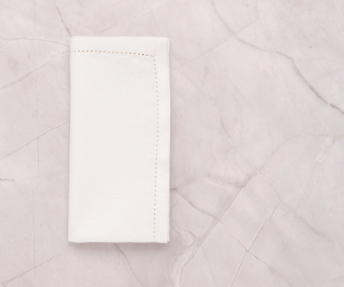 White hemstitched cotton-linen dinner napkins White hemstitched cotton-linen dinner napkins