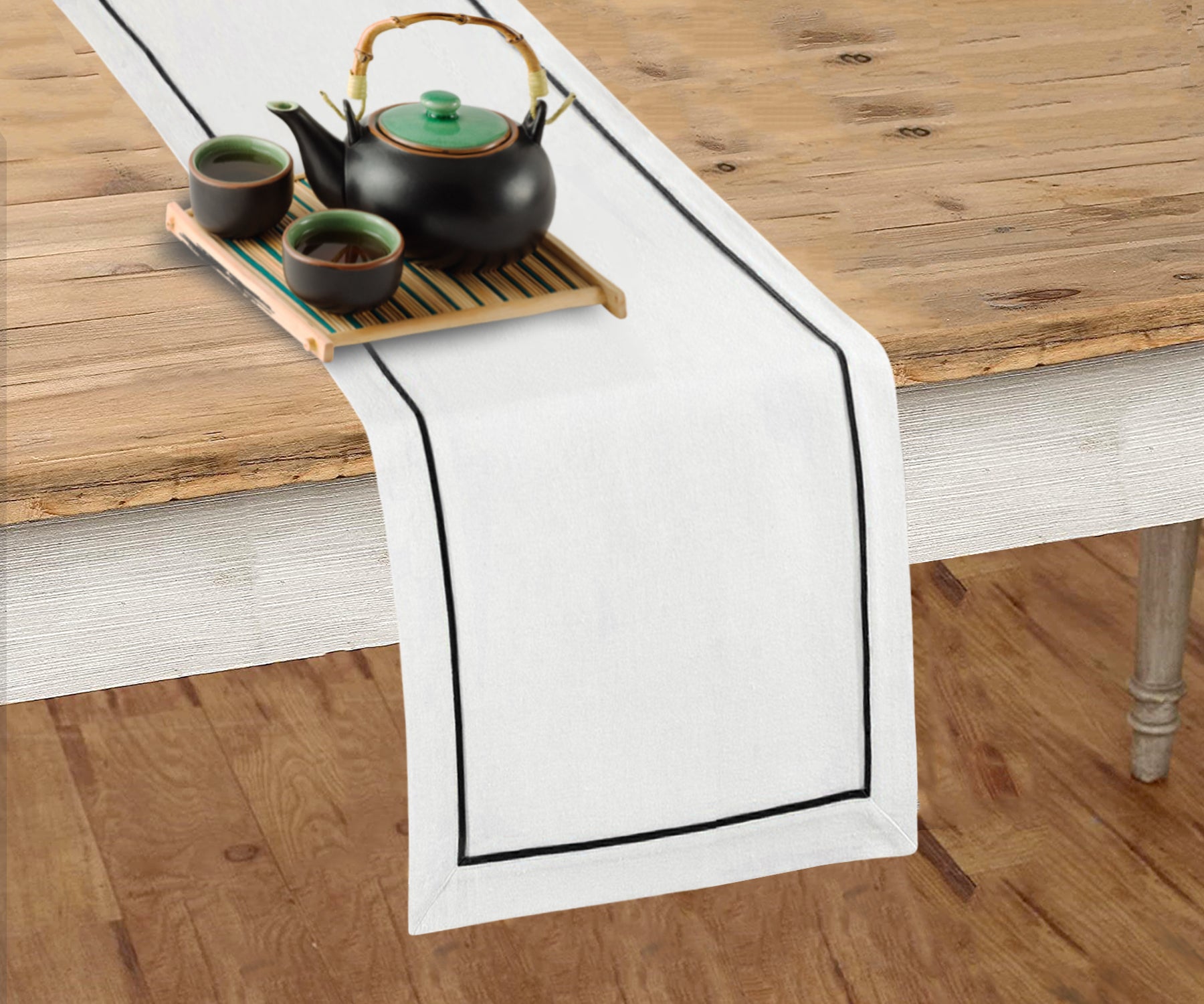 Vintage-inspired farmhouse table runner with charming details. Vintage-inspired farmhouse table runner with charming details.