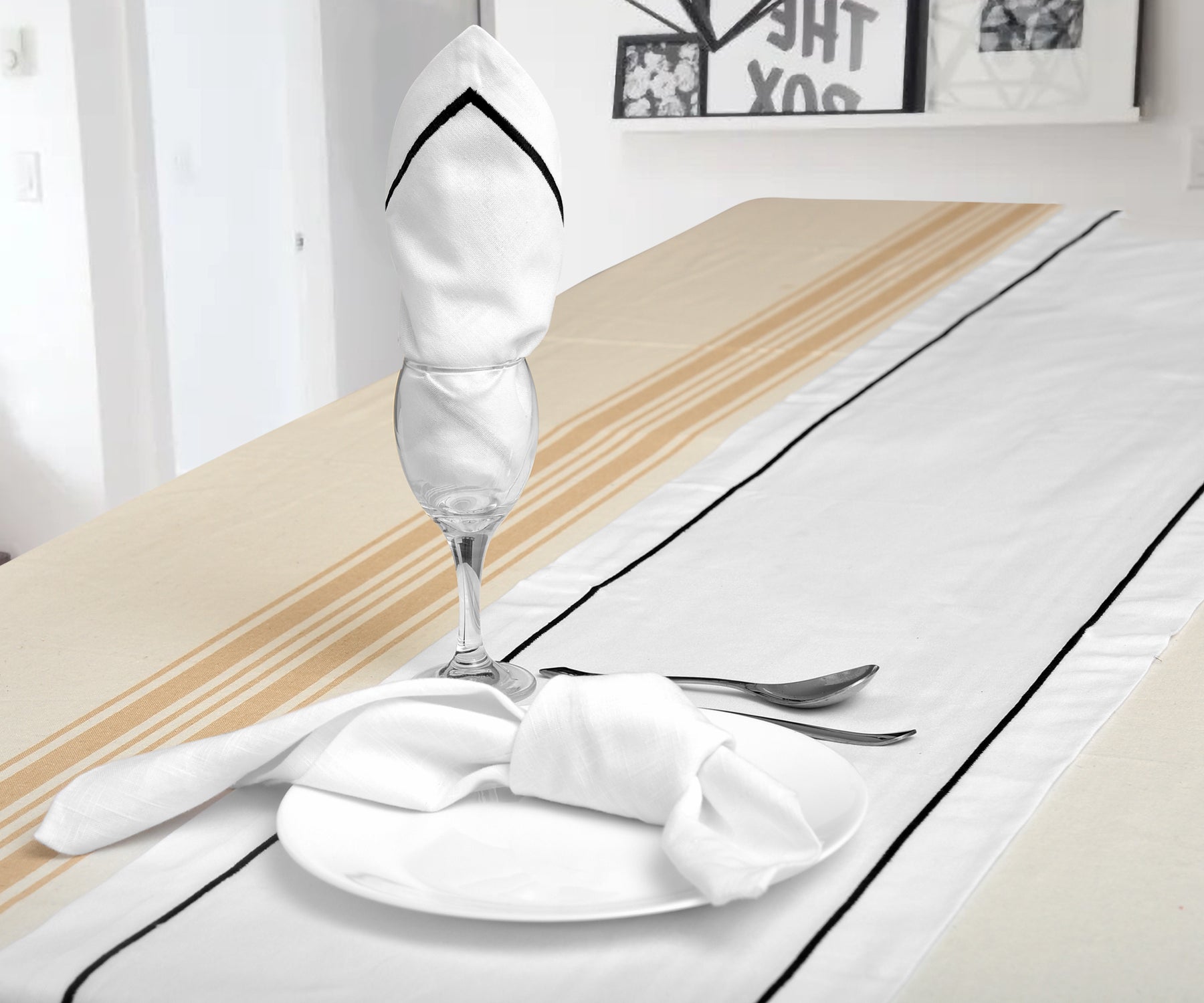 Cotton table runner embellished with subtle line embroidery. Cotton table runner embellished with subtle line embroidery.