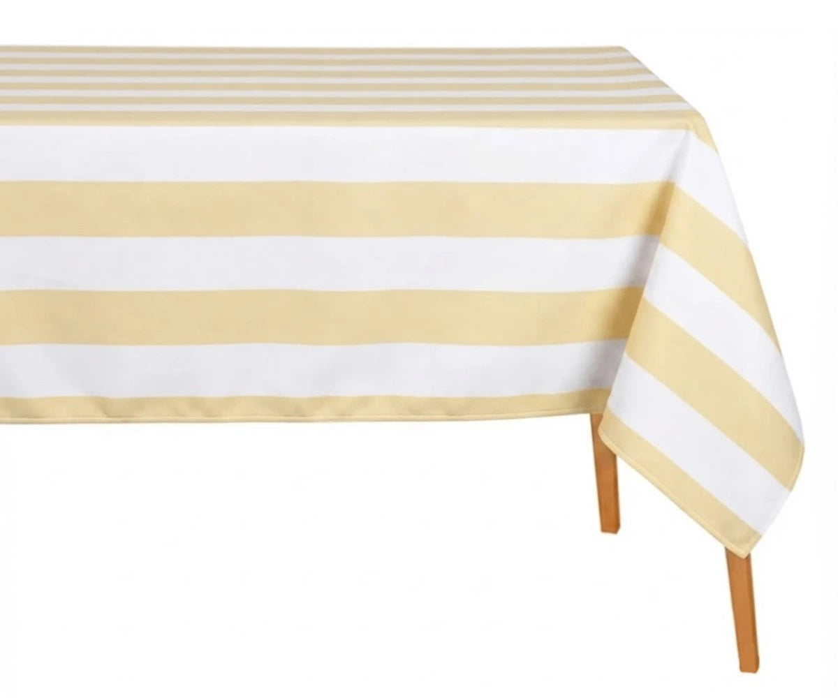 Butter Yellow and white wide cabana striped cotton linen tablecloth with straight edges draped over a dining table. Butter Yellow and white wide cabana striped cotton linen tablecloth with straight edges draped over a dining table.