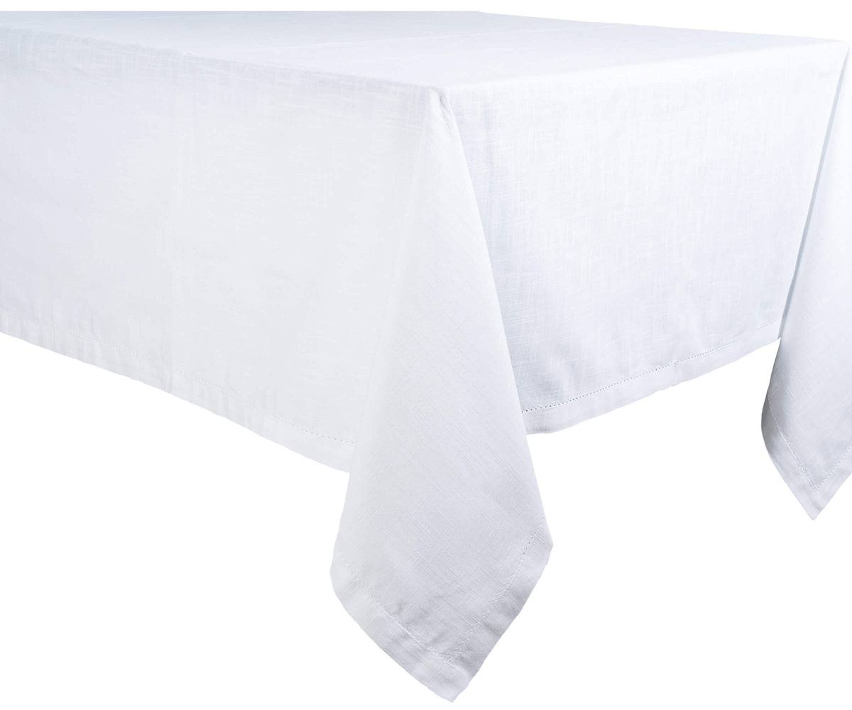 Elegant white tablecloth with hemstitch border for wedding table setting Elegant white tablecloth with hemstitch border for wedding table setting