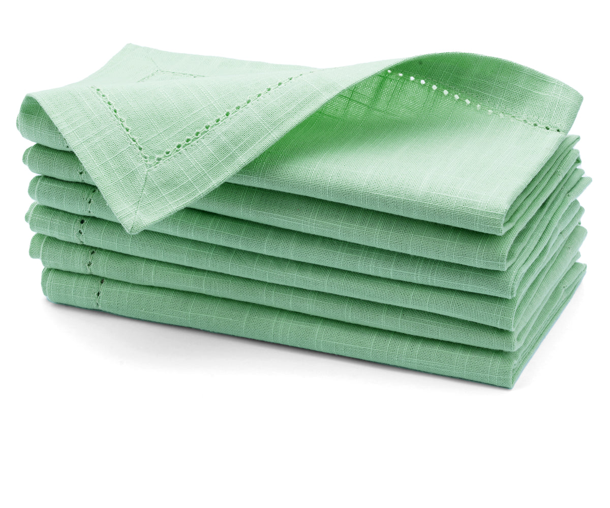 green napkins cloth are woven with cotton. cotton dinenr napkisn measures size of 18x18 green napkins cloth are woven with cotton. cotton dinenr napkisn measures size of 18x18