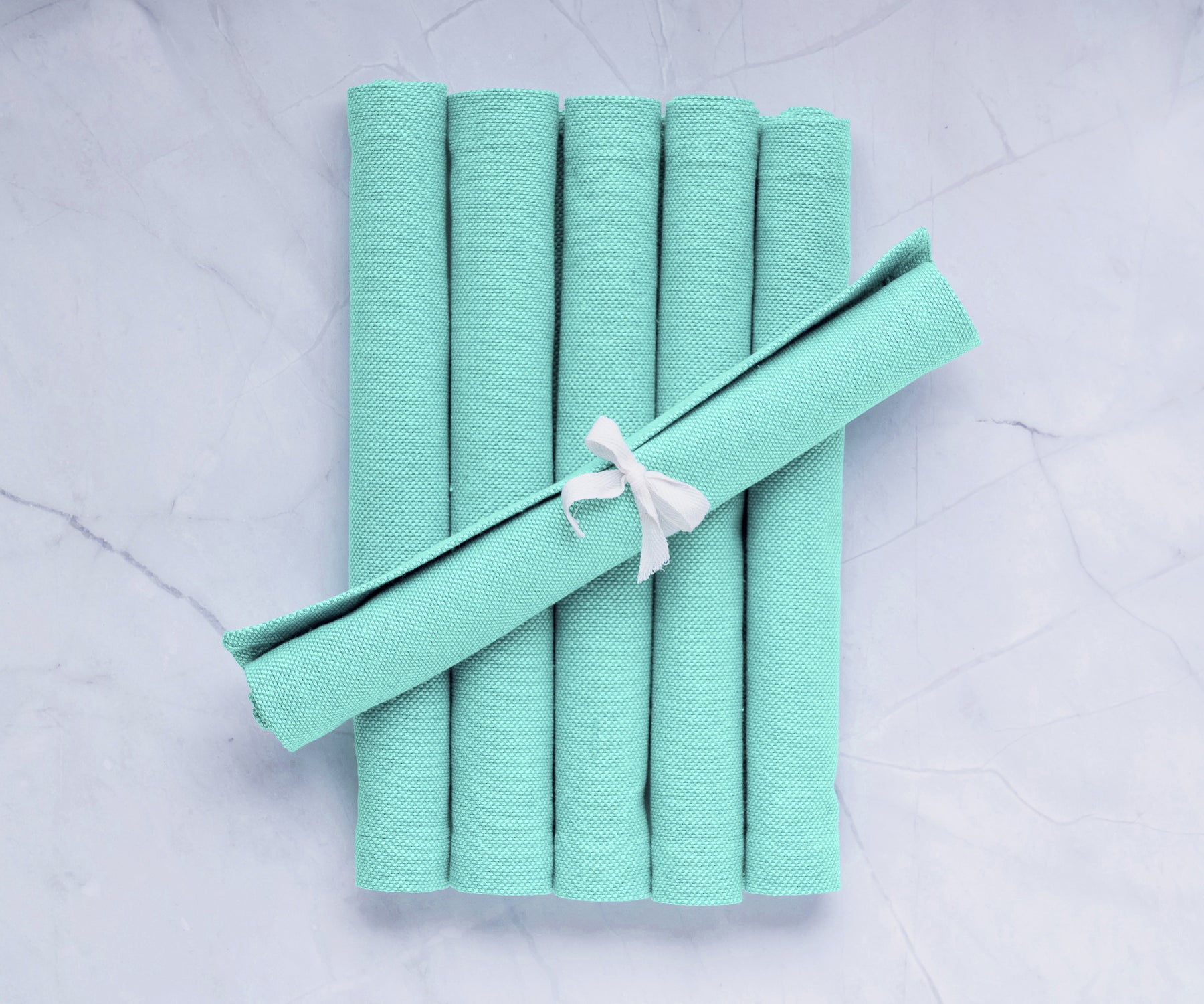 Upgrade your dining table with green fabric placemats, adding charm and protection for a delightful and stylish mealtime experience. Upgrade your dining table with green fabric placemats, adding charm and protection for a delightful and stylish mealtime experience.