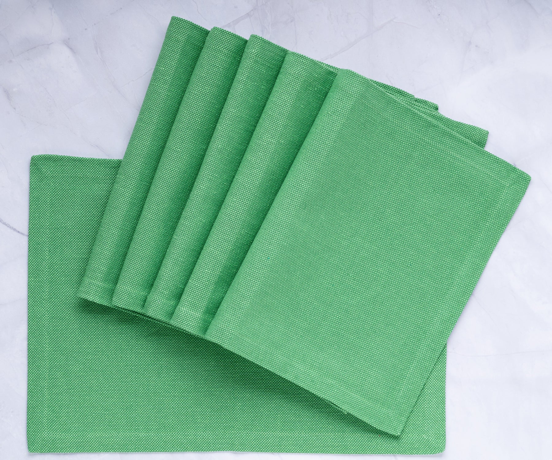 Upgrade your table decor with green fabric placemats, adding a touch of charm and protection, perfect for enjoyable dining moments. Upgrade your table decor with green fabric placemats, adding a touch of charm and protection, perfect for enjoyable dining moments.