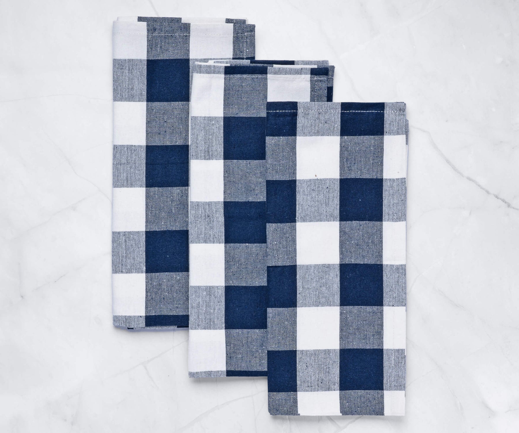These blue waffle weave kitchen towels are a versatile and absorbent choice for drying dishes, wiping counters, or cleaning up spills. These blue waffle weave kitchen towels are a versatile and absorbent choice for drying dishes, wiping counters, or cleaning up spills.