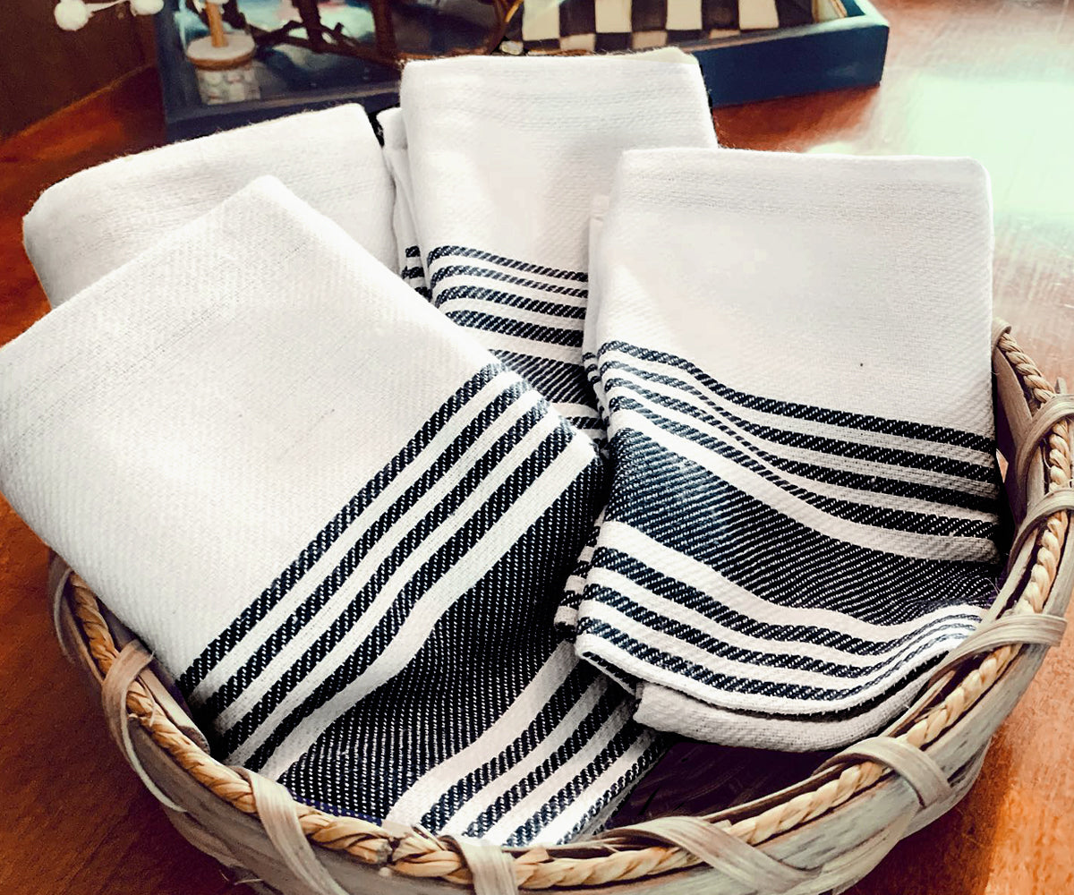 black striped towels - They are typically made from absorbent fabrics such as cotton or linen 