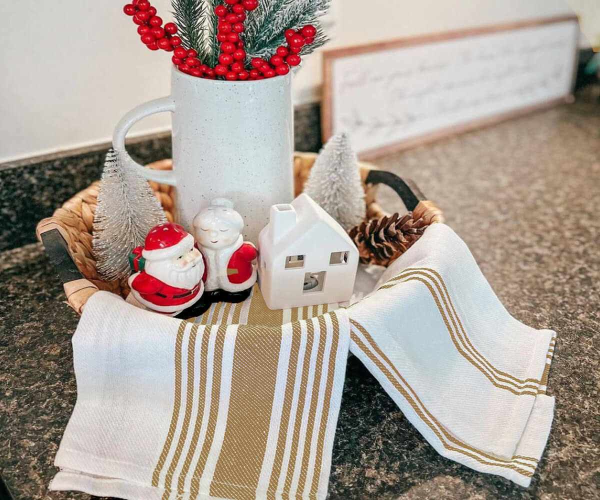 Set of 4 beige striped cotton kitchen towels neatly folded on countertop
 Set of 4 beige striped cotton kitchen towels neatly folded on countertop
