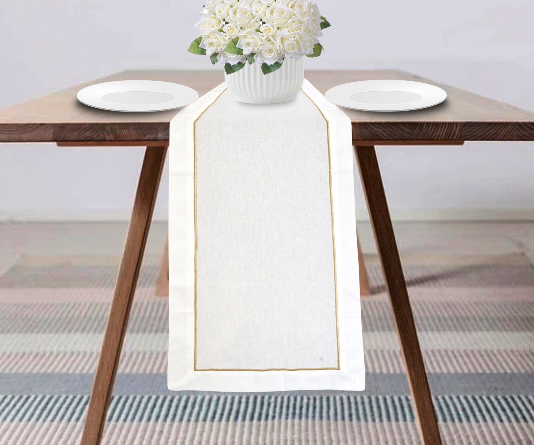 white table runner is designed  which seats up to 6 to 8 heads comfortably, beige table runner.