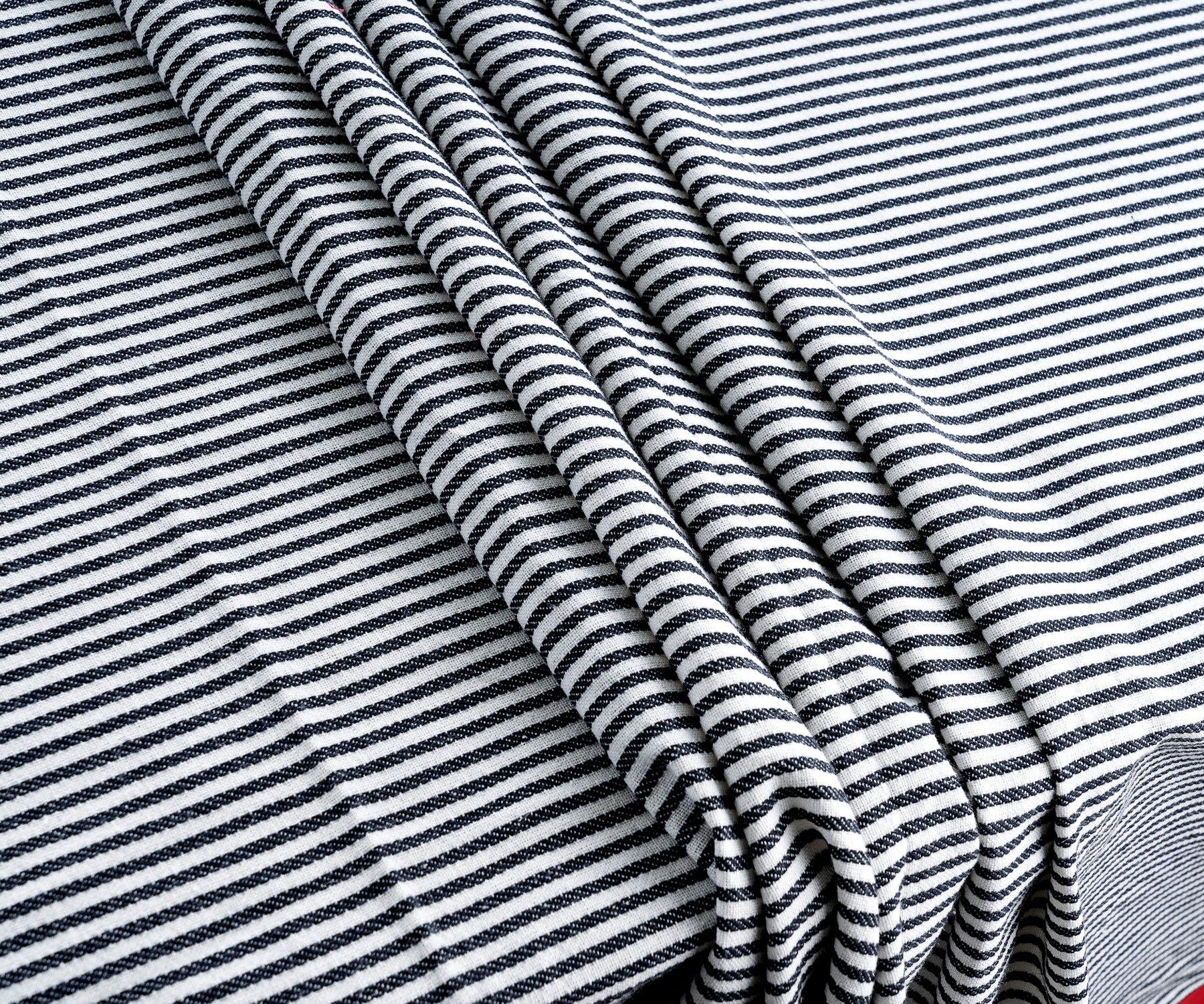 Upgrade your table aesthetic with a black & white cotton tablecloth, or celebrate Halloween with a thematic design, creating a captivating atmosphere.
