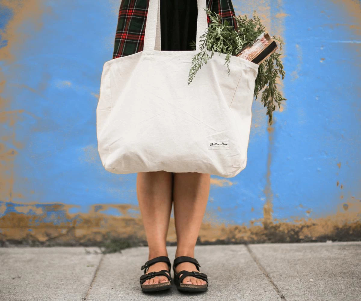 durable grocery shopping tote bags are made of 100% natural cotton. These sturdy carry-all tote bags hold a full load of groceries.