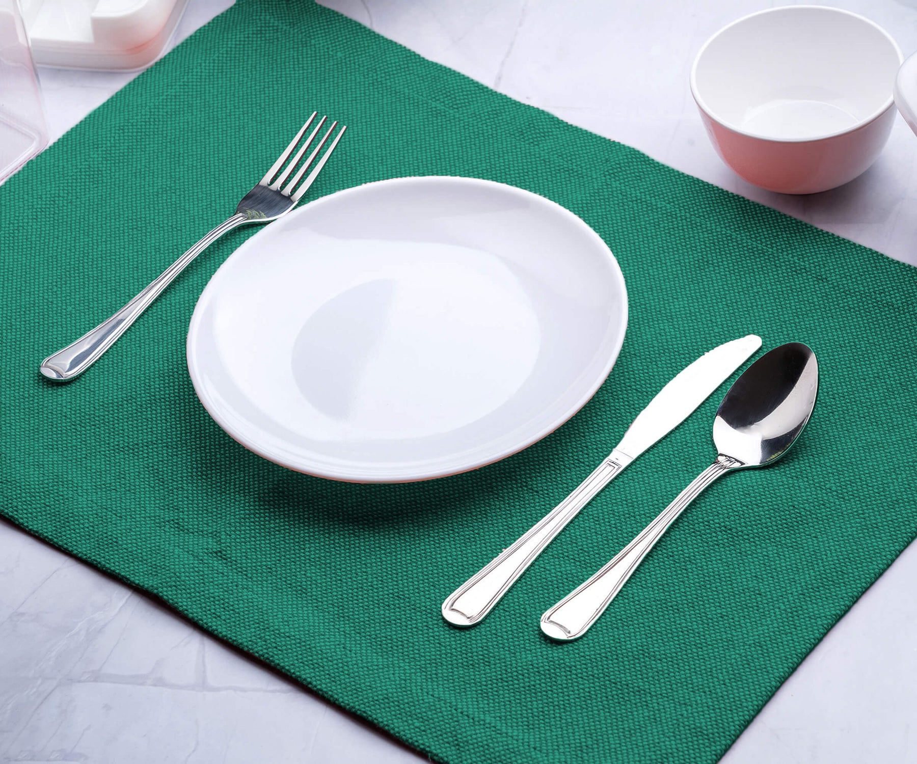 Upgrade your dining table with green fabric placemats, adding charm and protection for a delightful and stylish mealtime experience. Enjoy! Upgrade your dining table with green fabric placemats, adding charm and protection for a delightful and stylish mealtime experience. Enjoy!