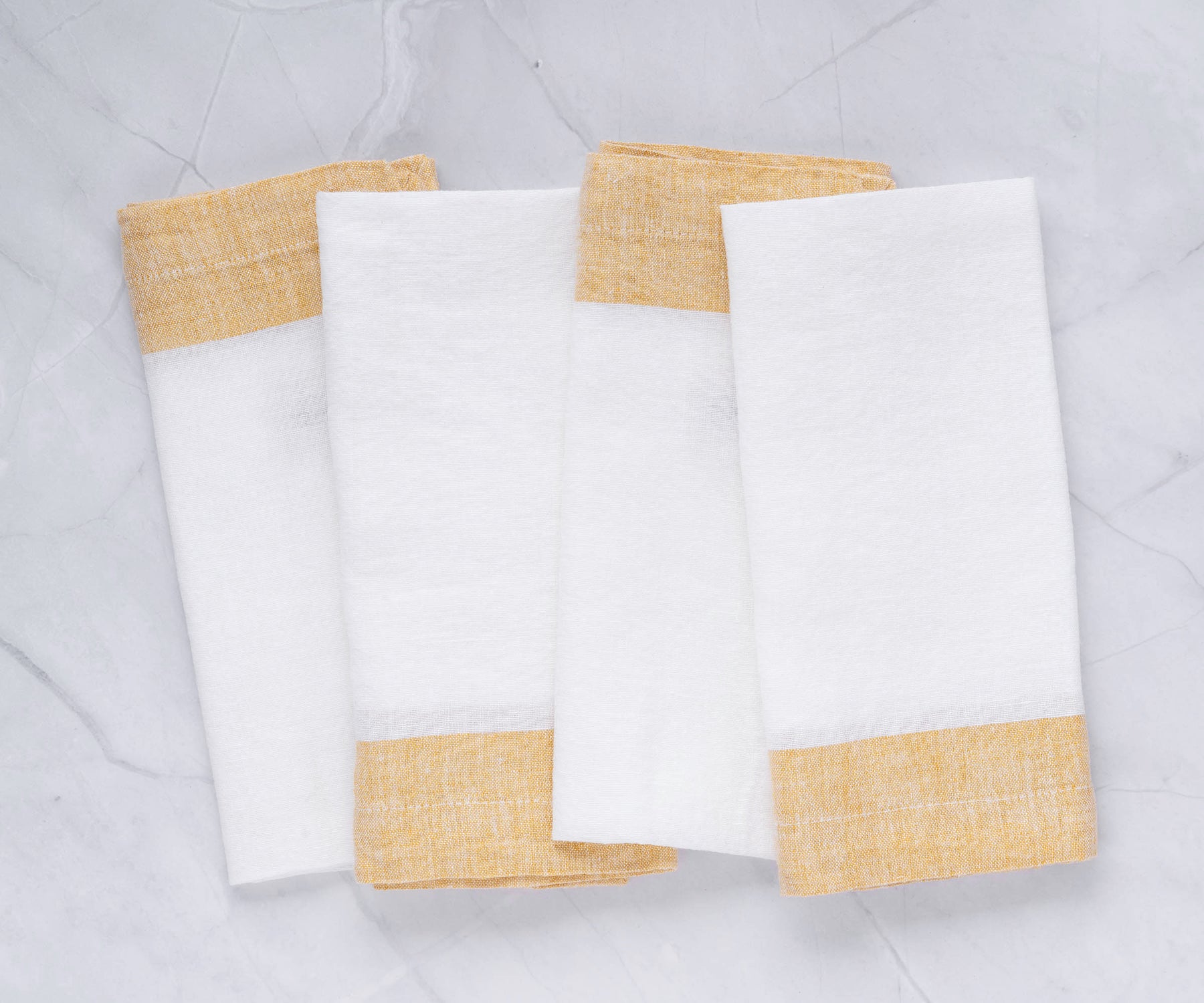 Elegant ivory wedding napkins showcased on beautifully decorated table Elegant ivory wedding napkins showcased on beautifully decorated table