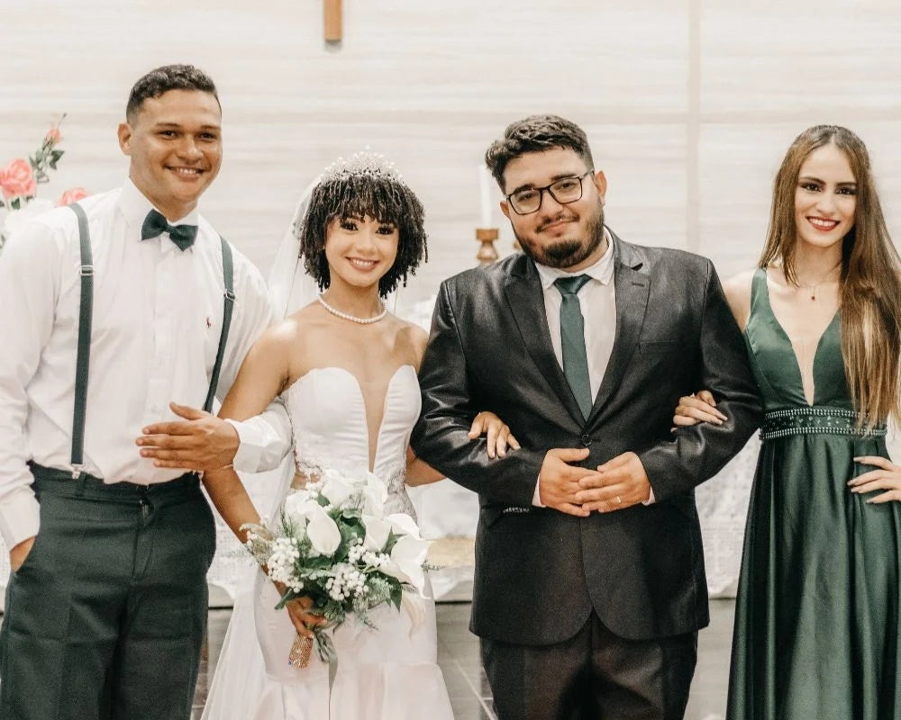 Wedding guests dressed in outfits for wedding dress codes