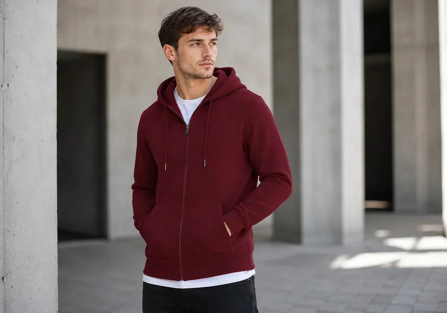 Men’s oversized hoodie styled with jeans and sneakers for a casual everyday streetwear outfit