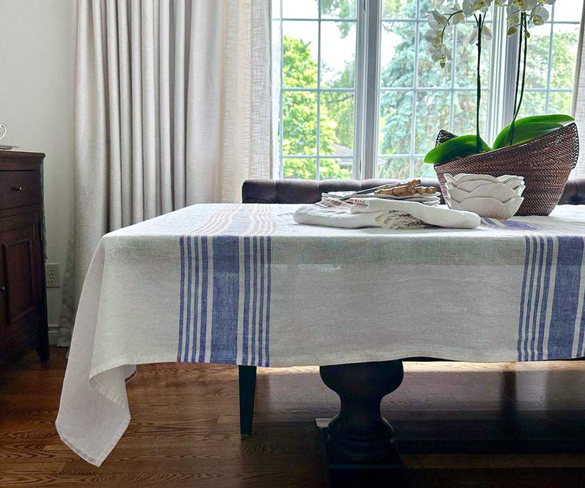 What are the best practices for washing linen tablecloths and properly caring for them?