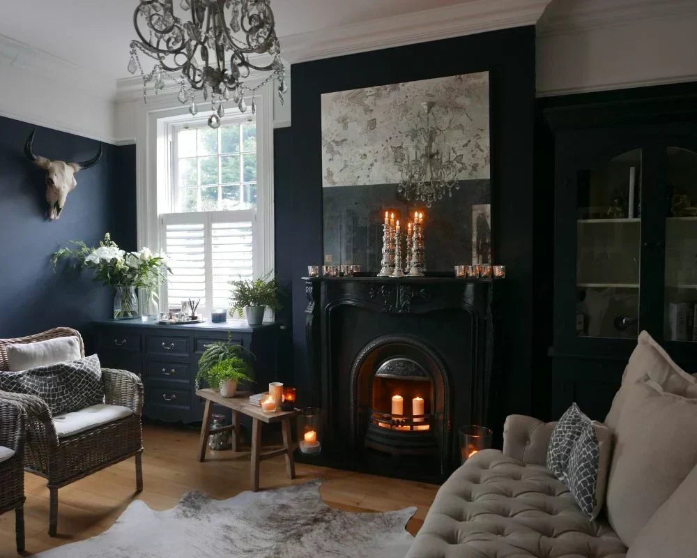 Vintage home decor arranged with classic furniture, clocks, watches, and decorative accents.