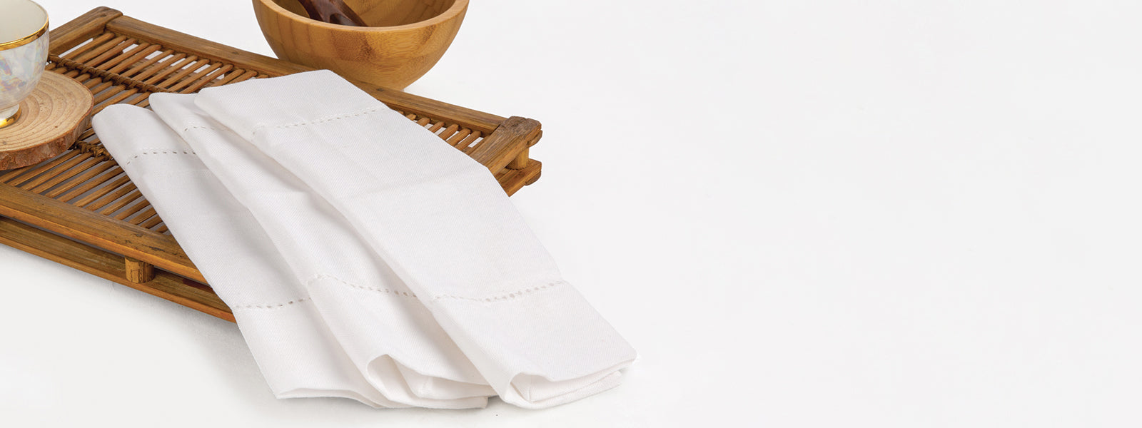 Elegant cotton and linen cocktail napkins in classic white, perfect for parties and events.