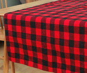  The red cotton tablecloth protects the surface of your table in a classy and elegant way with the red buffalo plaid tablecloth.