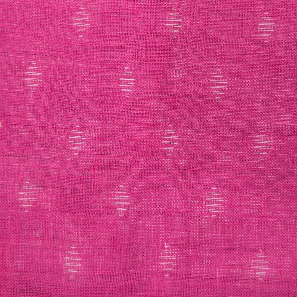 Pink fabric with small gold or white woven motifs