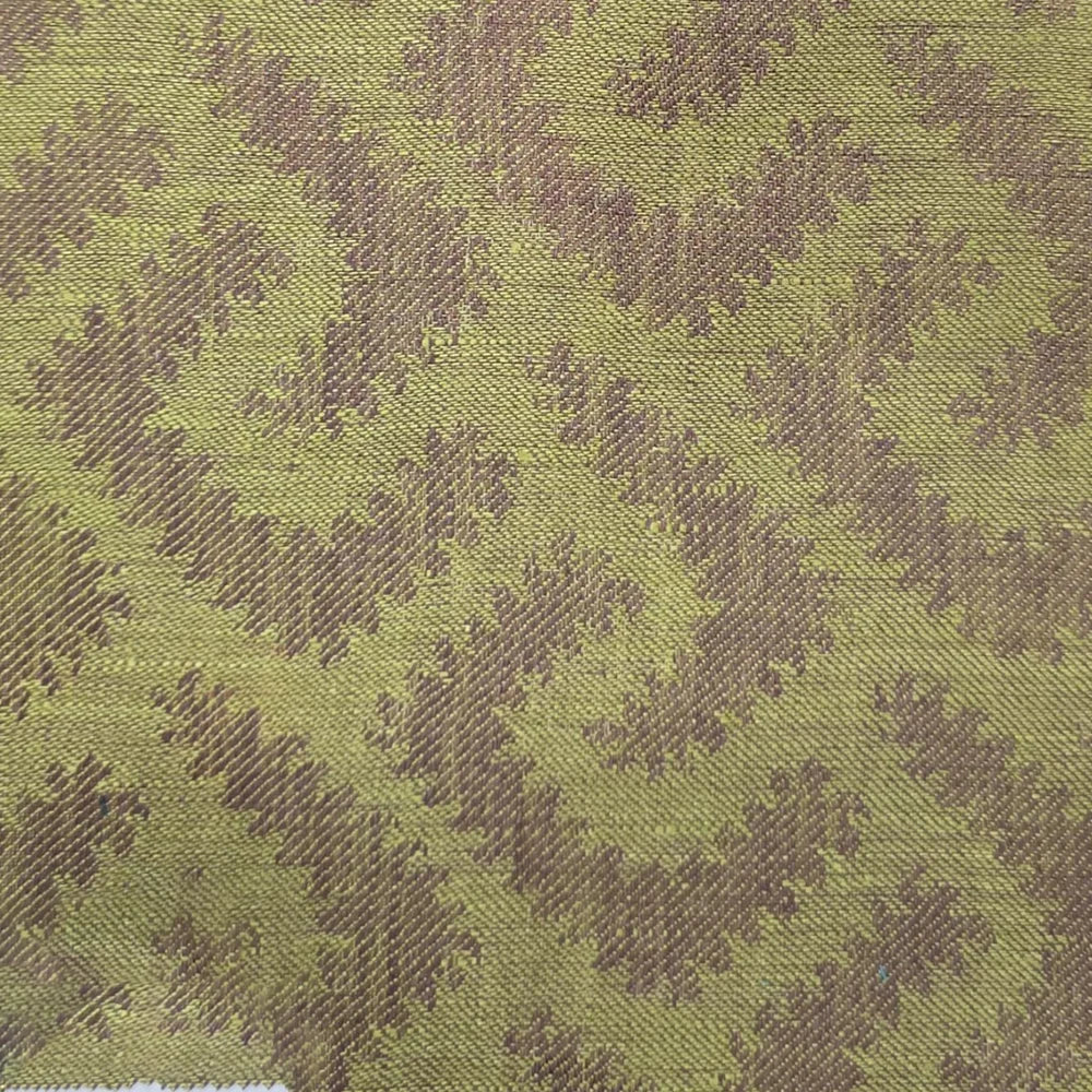 Beige and olive green geometric patterned fabric -  Close up