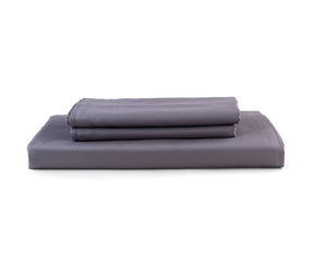 Folded grey cotton flat sheet showcasing soft sheen and fine weave