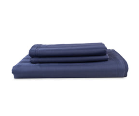 Folded striped cotton flat sheet showing smooth texture and fine weave